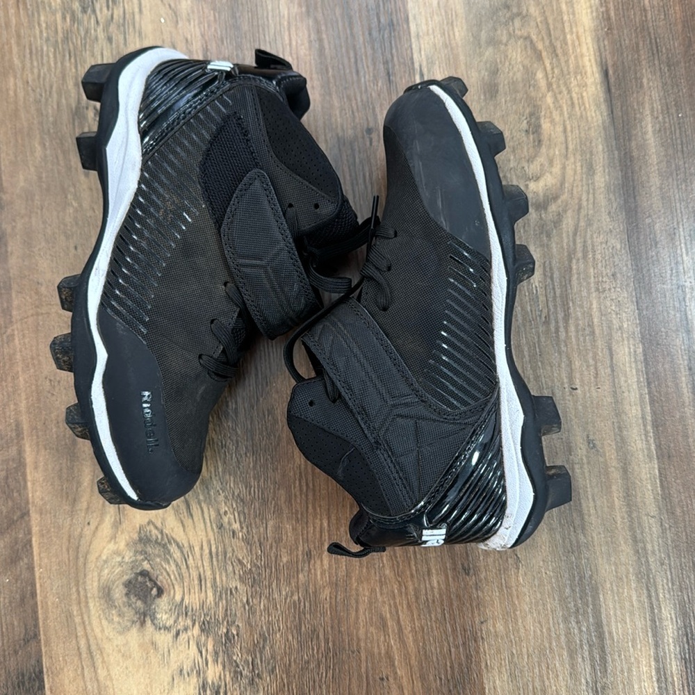Boys Riddell football cleats.